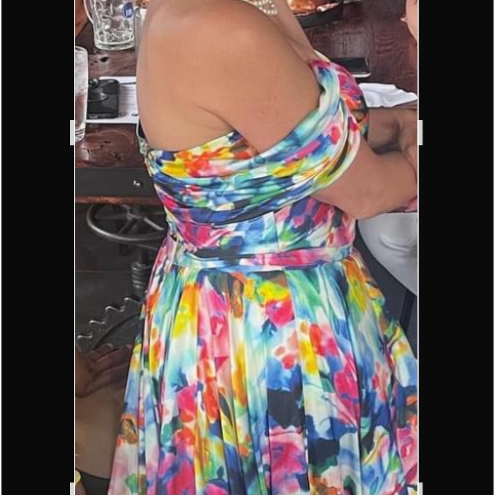 Jovani dress, size 10. I added the sleeves . So they can be removed.